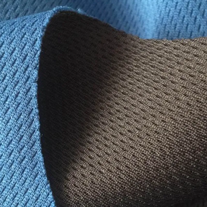 Blue and brown bonded cloths folded back to show the layered edge