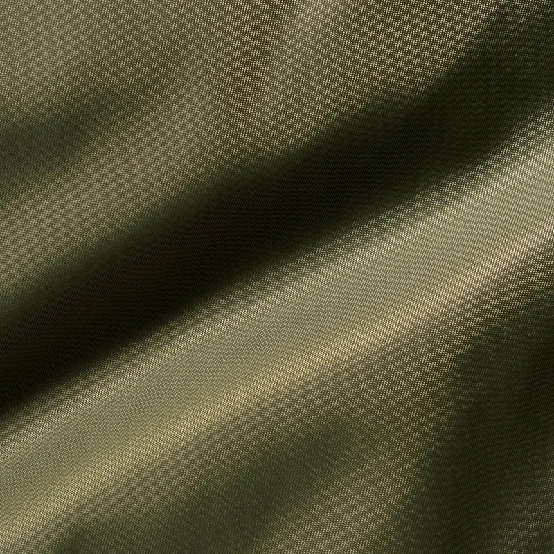 Drab olive cloth in glossy diagonal folds, the sheen catching along each ridge