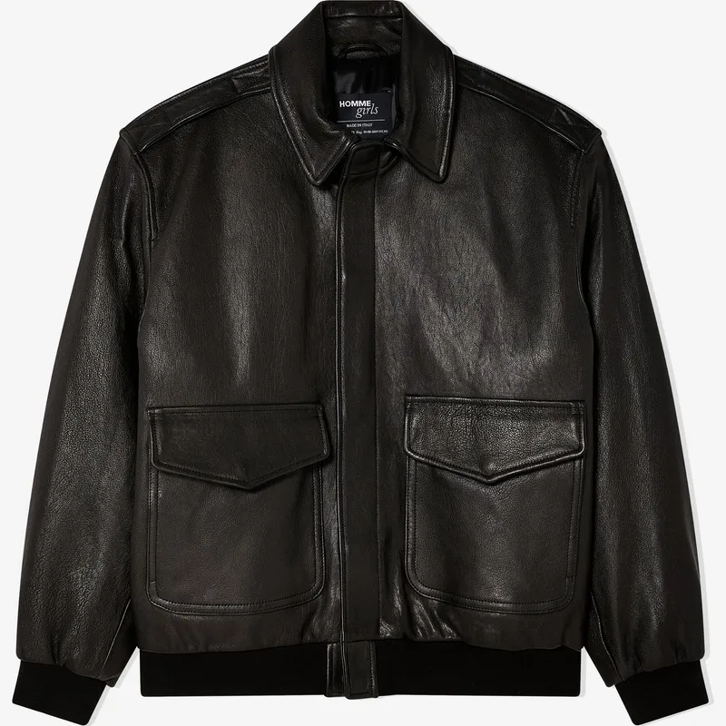 Brown leather bomber photographed flat, with flap pockets and ribbed cuffs and hem
