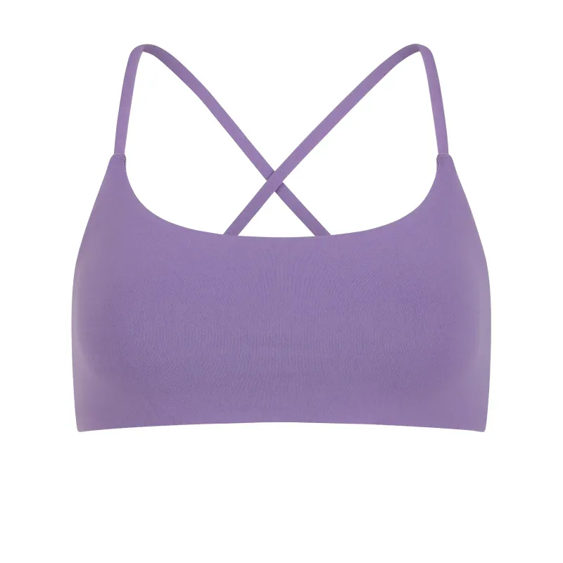 Lilac studio bra from behind, thin straps crossing once over an open back