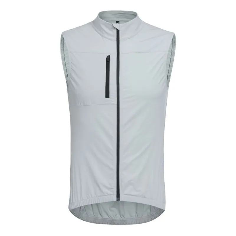 Pale grey gilet laid flat, a black zip down the middle and a second black zip closing the chest pocket