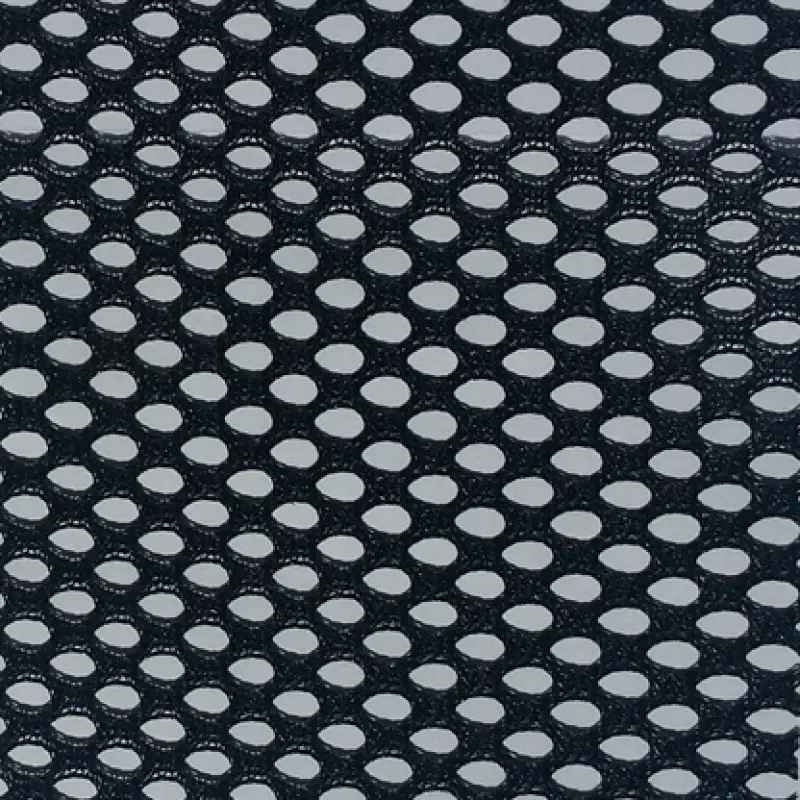 Open-hole navy mesh photographed flat, pale light showing through every eyelet