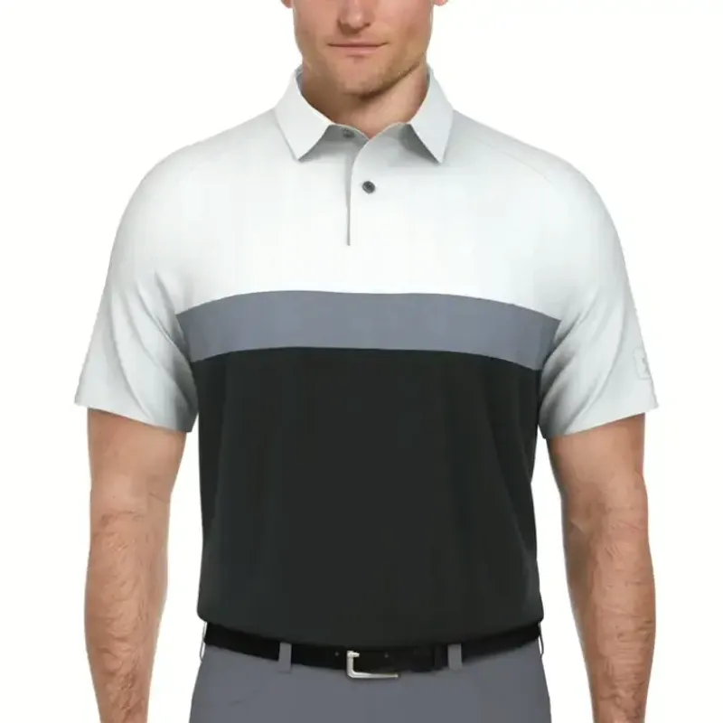 Worn on a model, a polo built from a white upper block, a grey band and a black lower