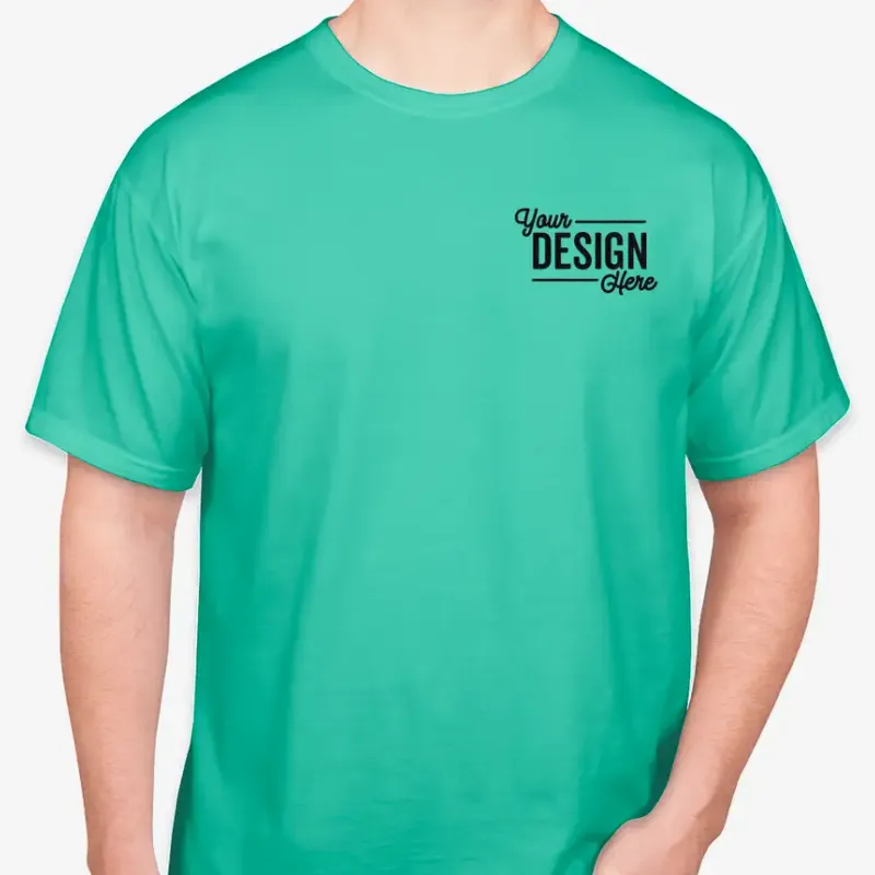 Flat placeholder lettering reading Your DESIGN Here on the chest of a green tee worn by a model