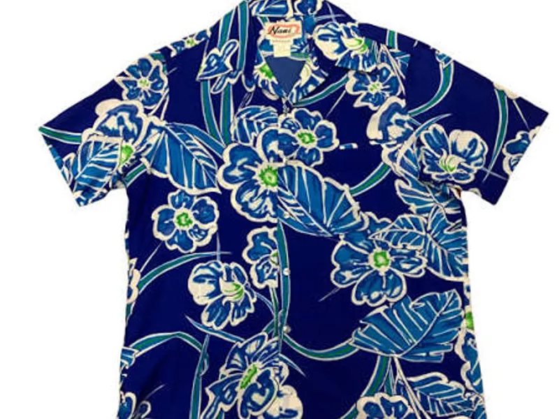 Vintage aloha shirt in a muted tropical print