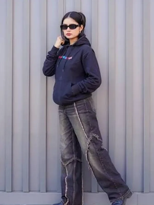 A customer wearing a custom hoodie, on body