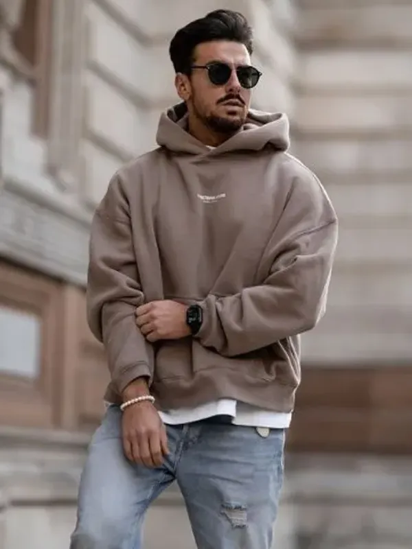 A customer wearing a custom hoodie, on body