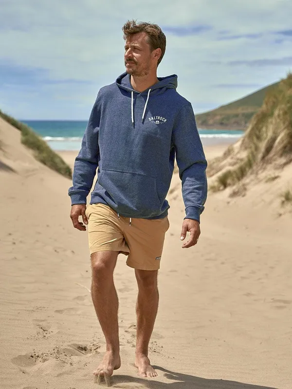 A customer wearing a custom hoodie, full length