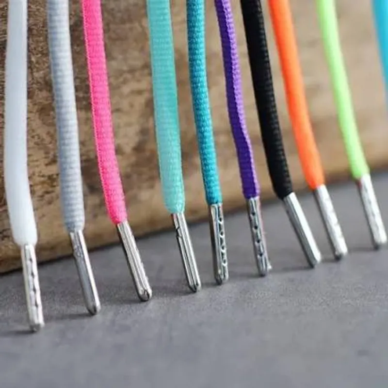 A hoodie drawstring aglet tip and eyelet