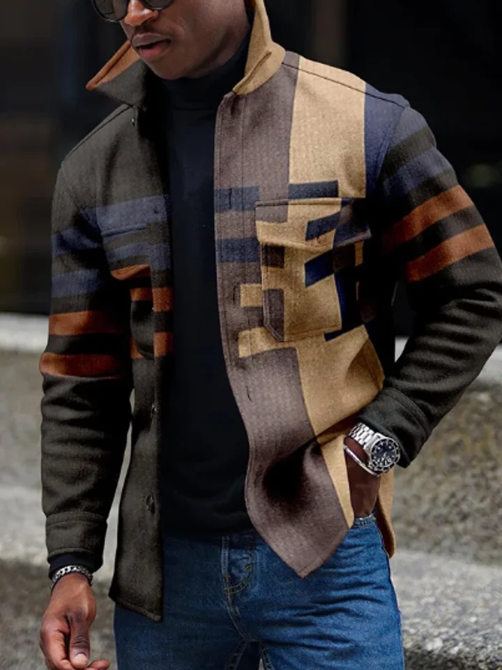 Patterned zip jacket with a colour-block geometric print, worn over a dark turtleneck