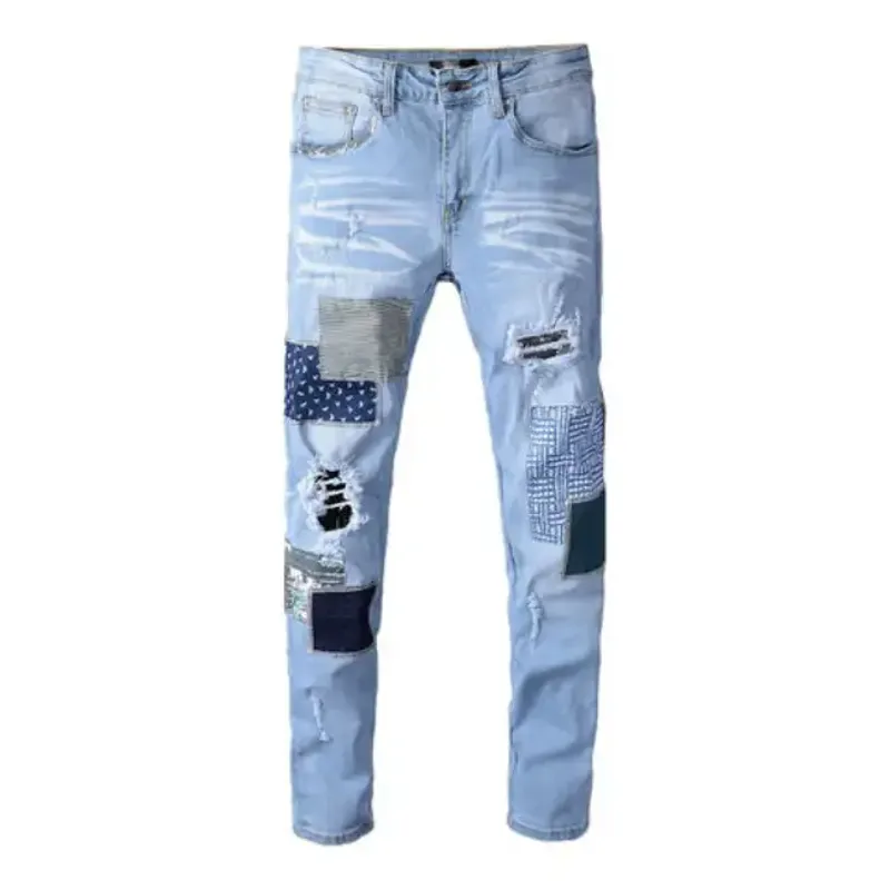 Light-blue distressed skinny jeans with patch details
