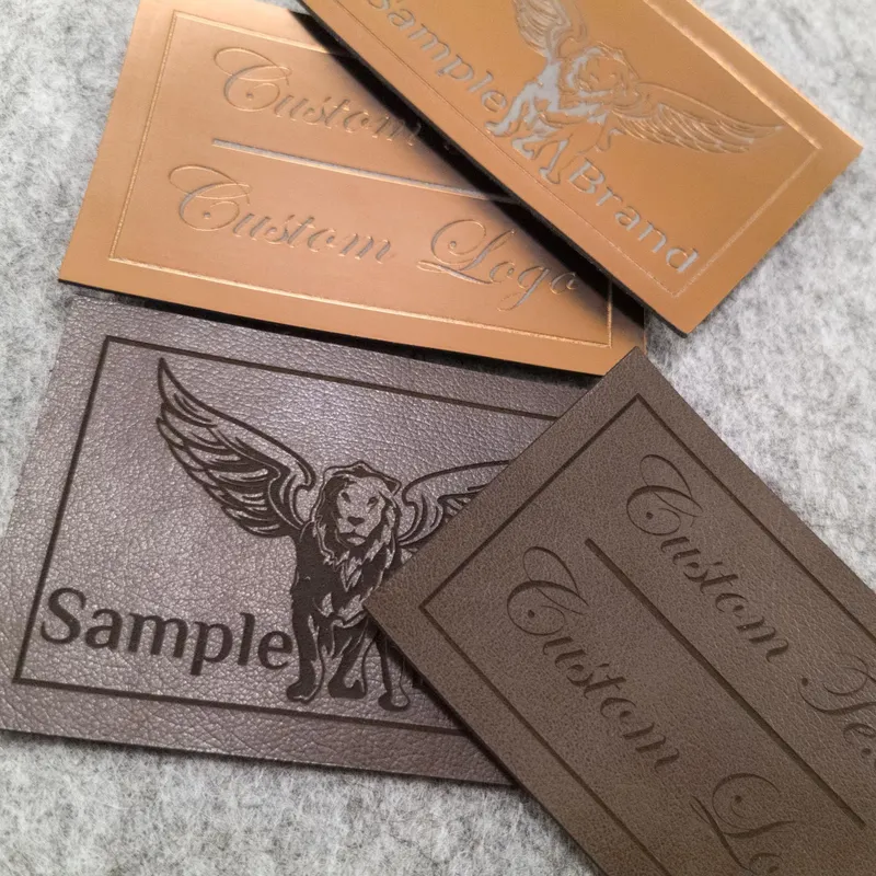 Custom embossed leather brand patches with a lion logo