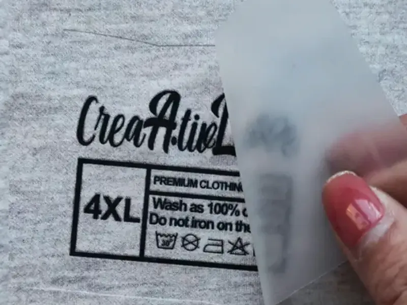 Tagless heat-transfer label pressed into the fabric