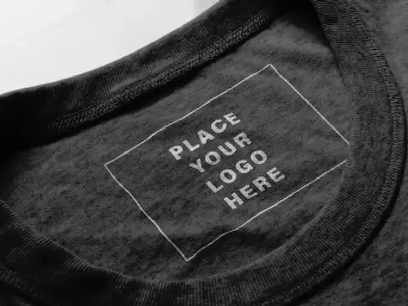 Screen-printed label applied flat to the fabric