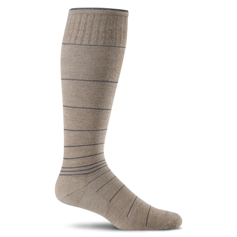 A tall beige compression sock banded with thin navy lines up the leg