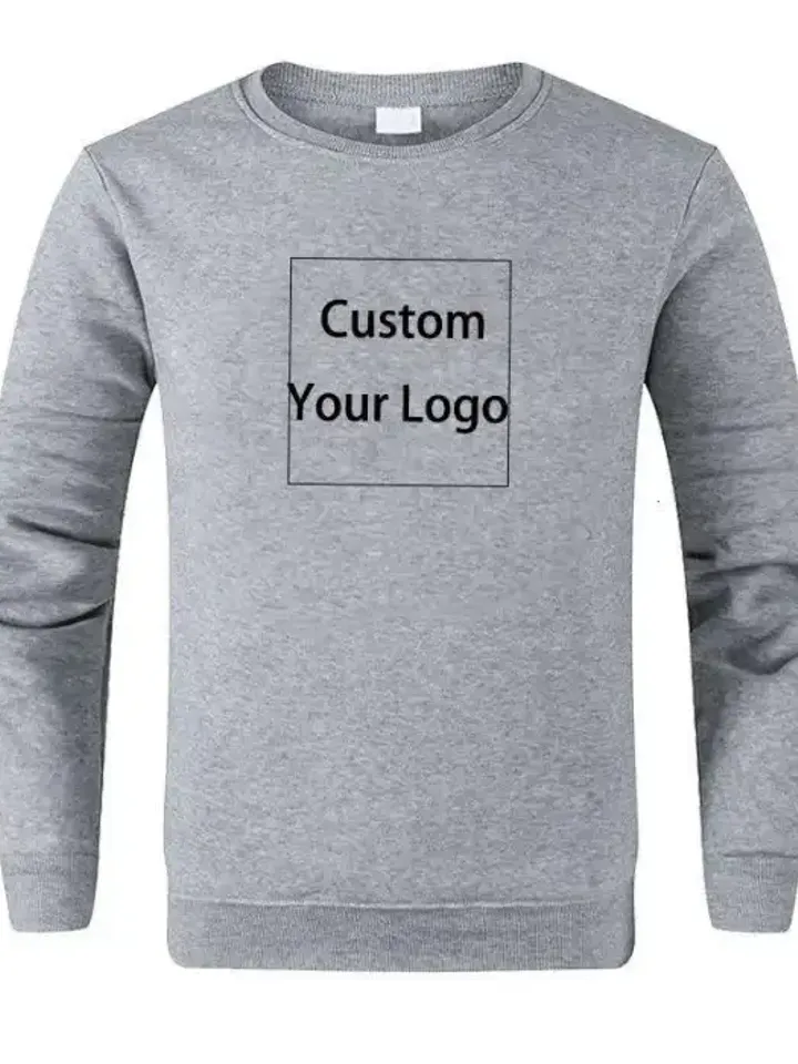 Flat-lay of a grey crewneck sweatshirt with a blank logo panel on the chest