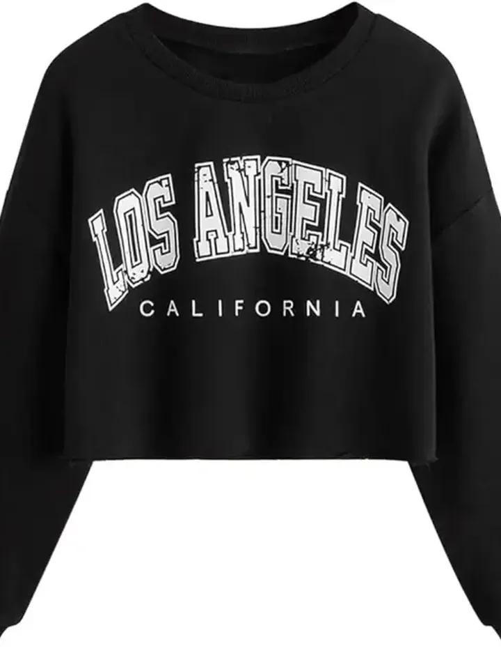 Flat-lay of a black cropped crewneck sweatshirt with a varsity-style chest print