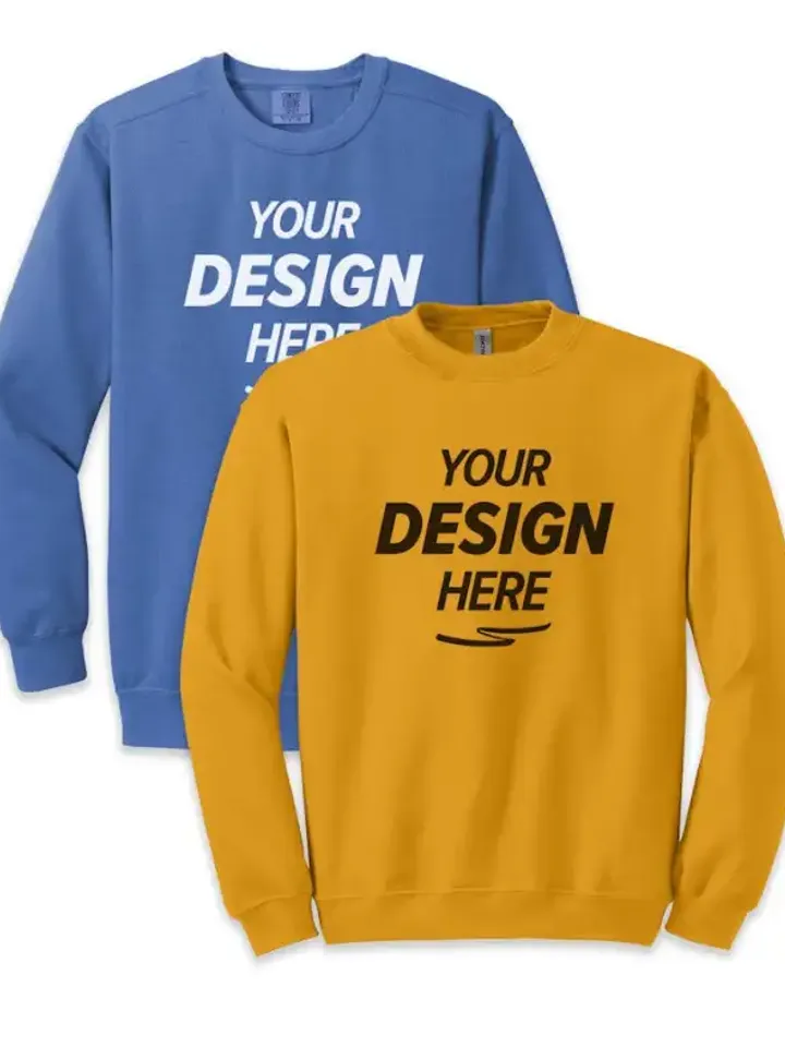Flat-lay of two stacked crewneck sweatshirts in blue and yellow