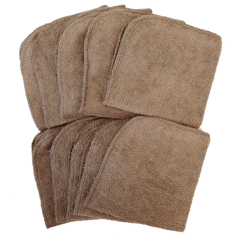 Rounded taupe terry washcloths fanned out into a stack