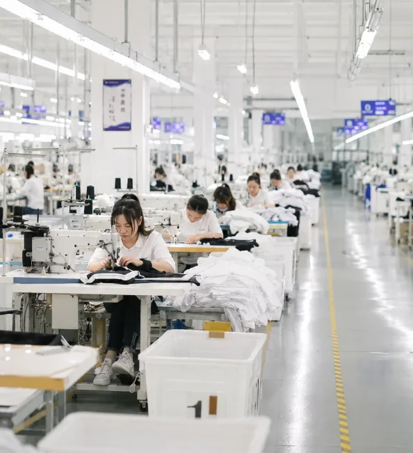 Sewing operators at their machines on the production floor